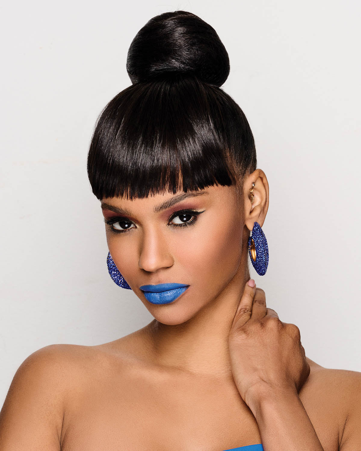 Sleek Style Bun & Bangs - By Laura Mayers