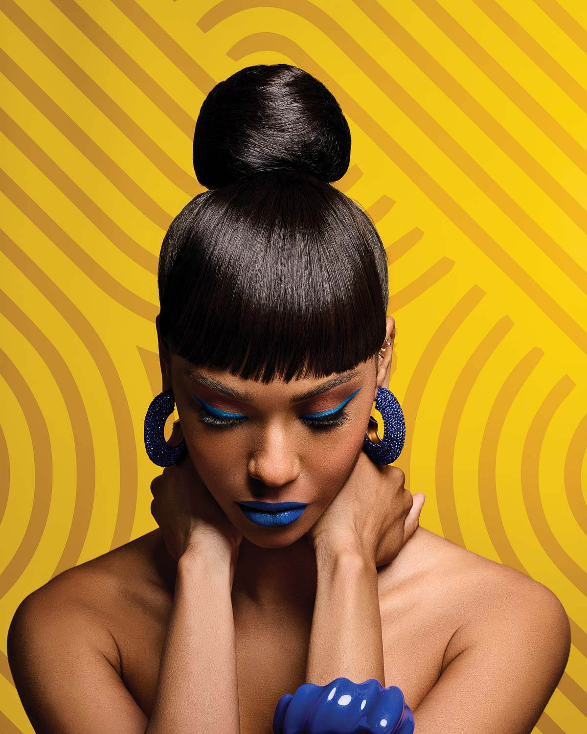 Sleek Style Bun & Bangs - By Laura Mayers
